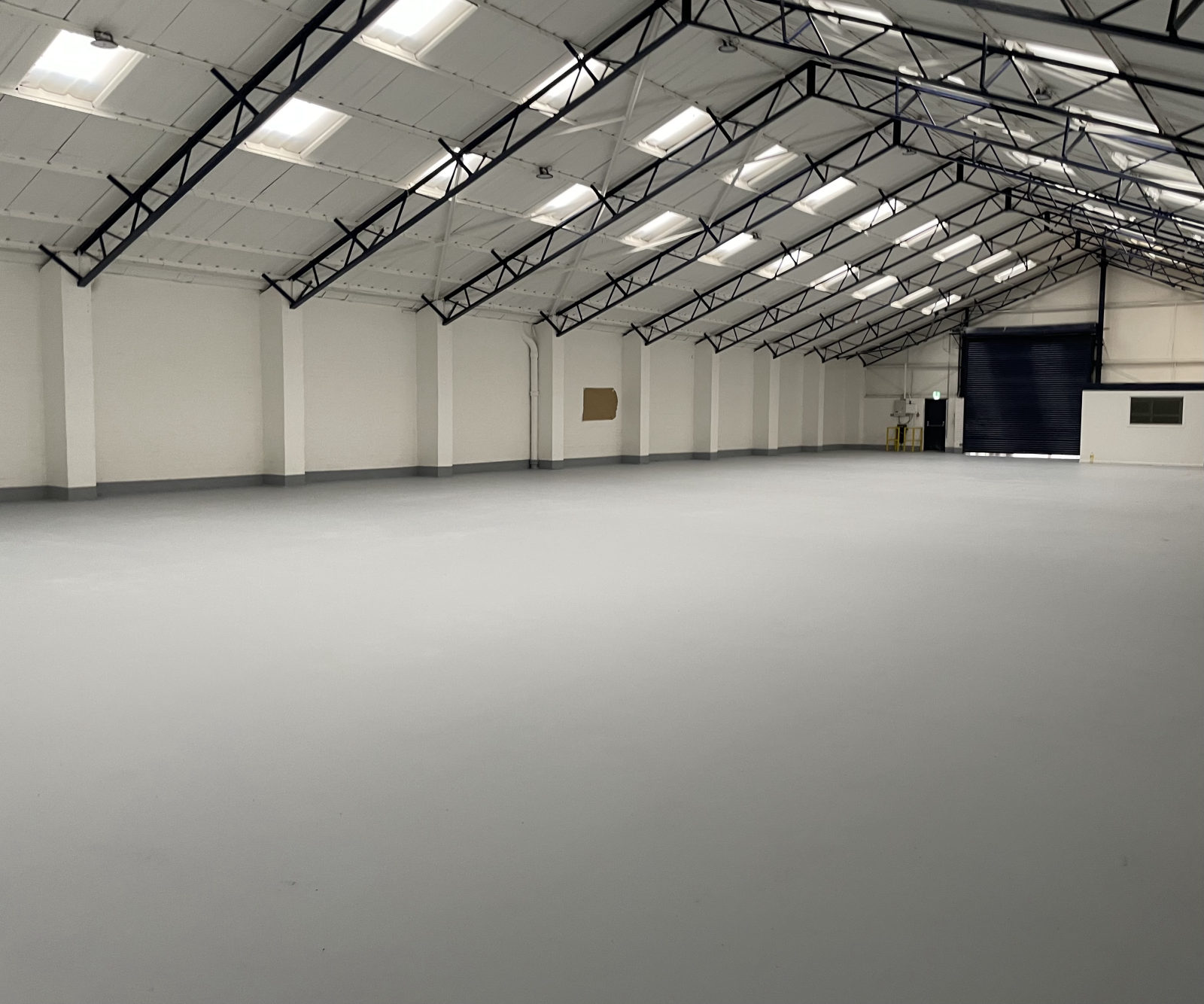 Expansive industrial warehouse with a seamless resin floor