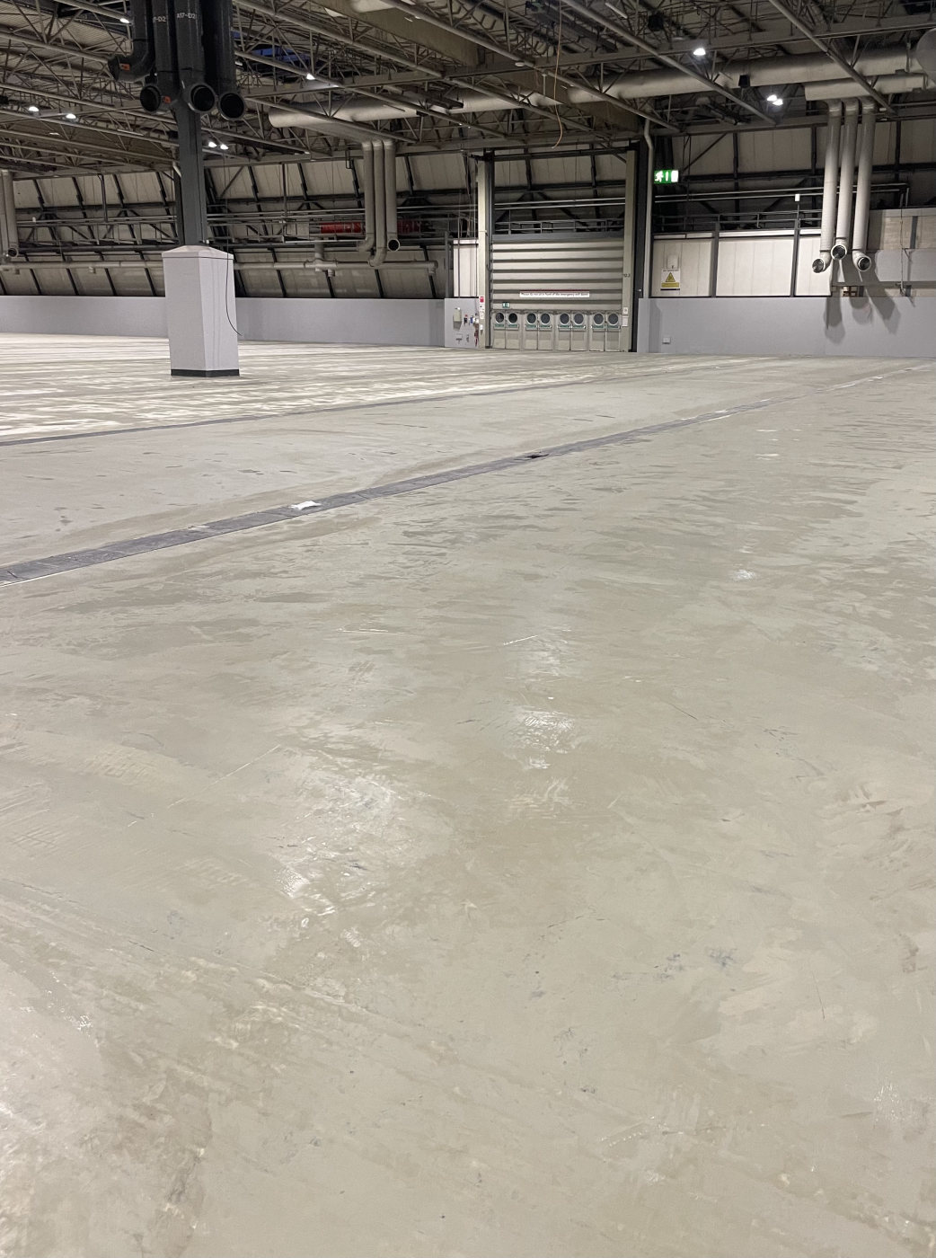 A resin floor across a large exhibition hall